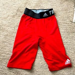 Brand new TechFit Adidas compression shorts red